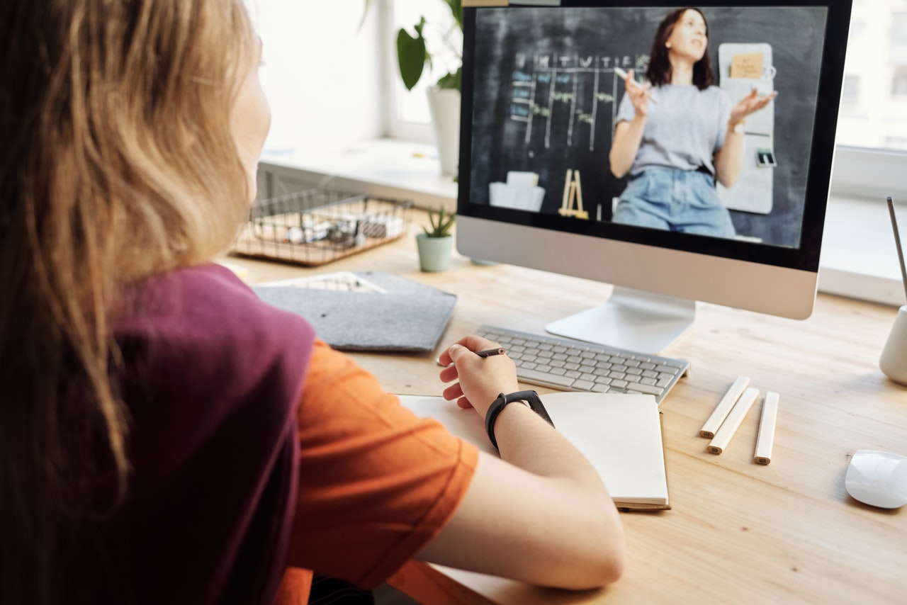 student being graded in an online course
